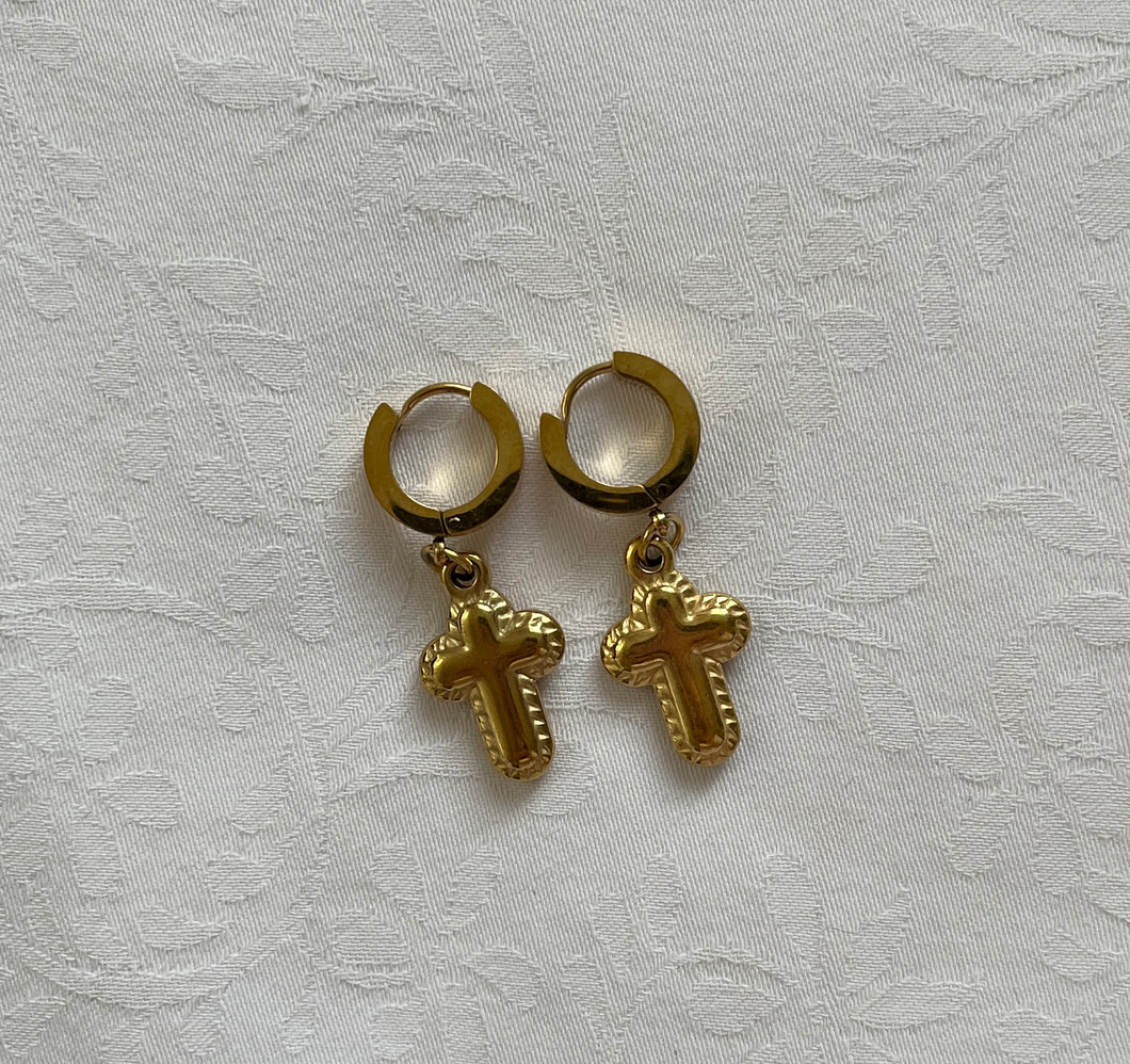 Small Huggie hoops with ornate cross drop pendant gold plated earrings.