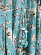 Load image into Gallery viewer, Kaya MAXI DRESS With Tassels, in Pale Blue FLORAL and Birds Print sizes L xl
